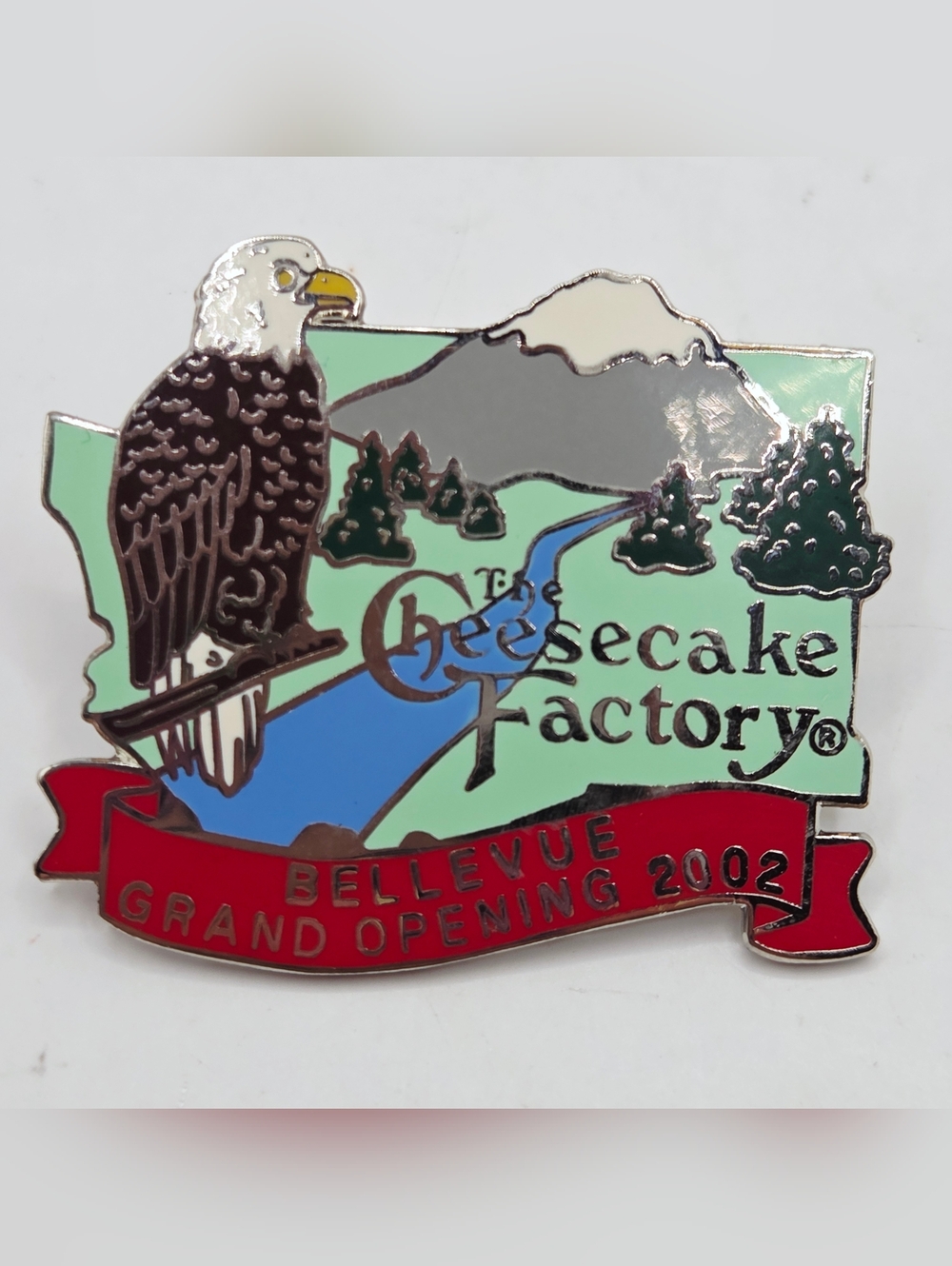 CHEESECAKE FACTORY PIN BELLEVUE GRAND OPENING 2002 BALD EAGLE SNOW MOUNTAINS